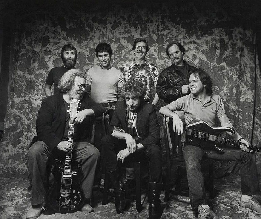Herb Greene - Bob Dylan and the Grateful Dead, 1987: HERB GREENE (B. 1942) Bob Dylan and the Grateful Dead, 1987 Photographic print capturing iconic musicians Bob Dylan and the Grateful Dead in a candid 1987 moment. Herb Greene’s work is celebrated fo