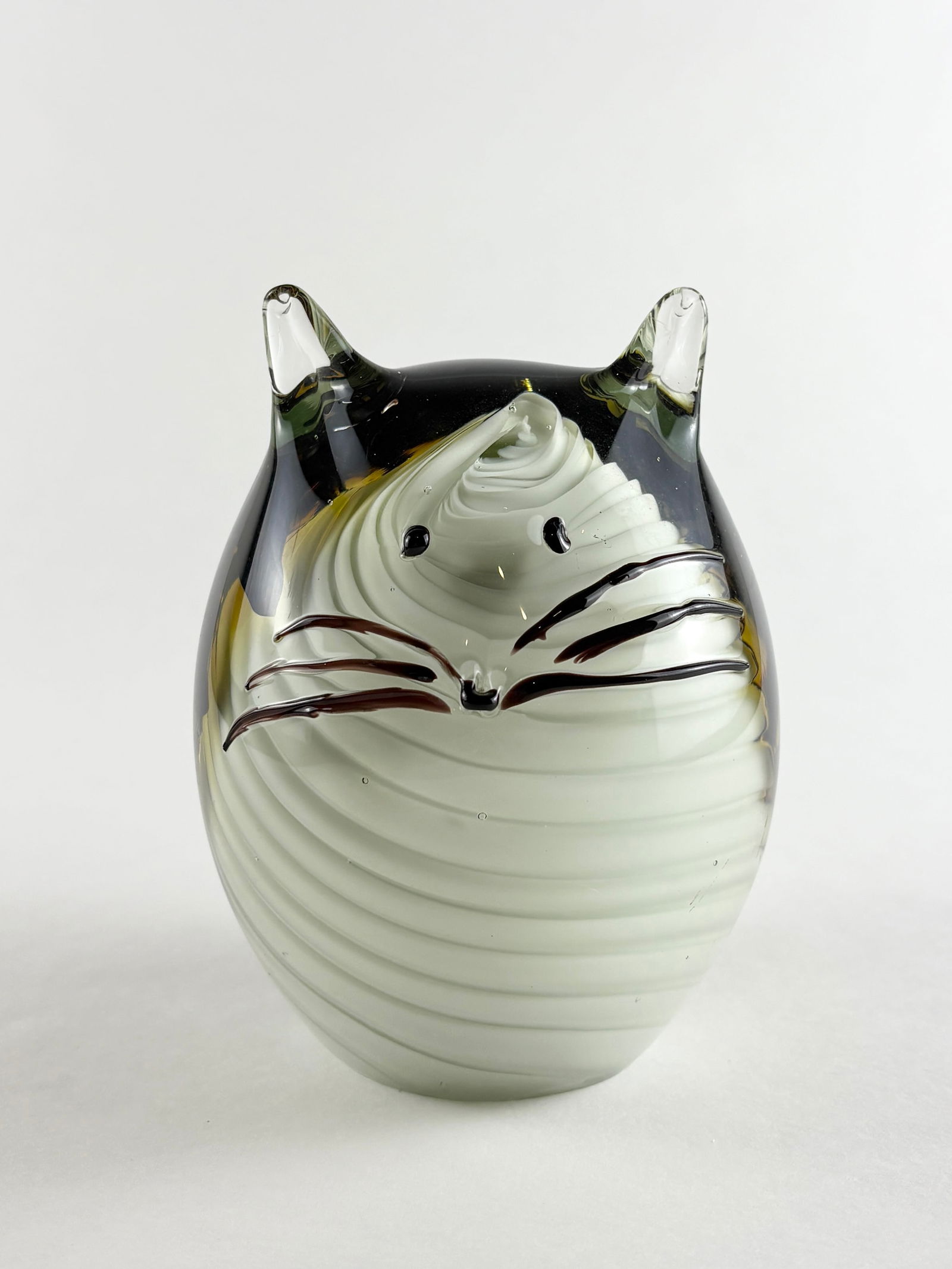 Art Glass Cat: Art Glass Cat, Glass Cat Glass Height: 5 inches A decorative art glass cat with striped detailing and applied facial features.