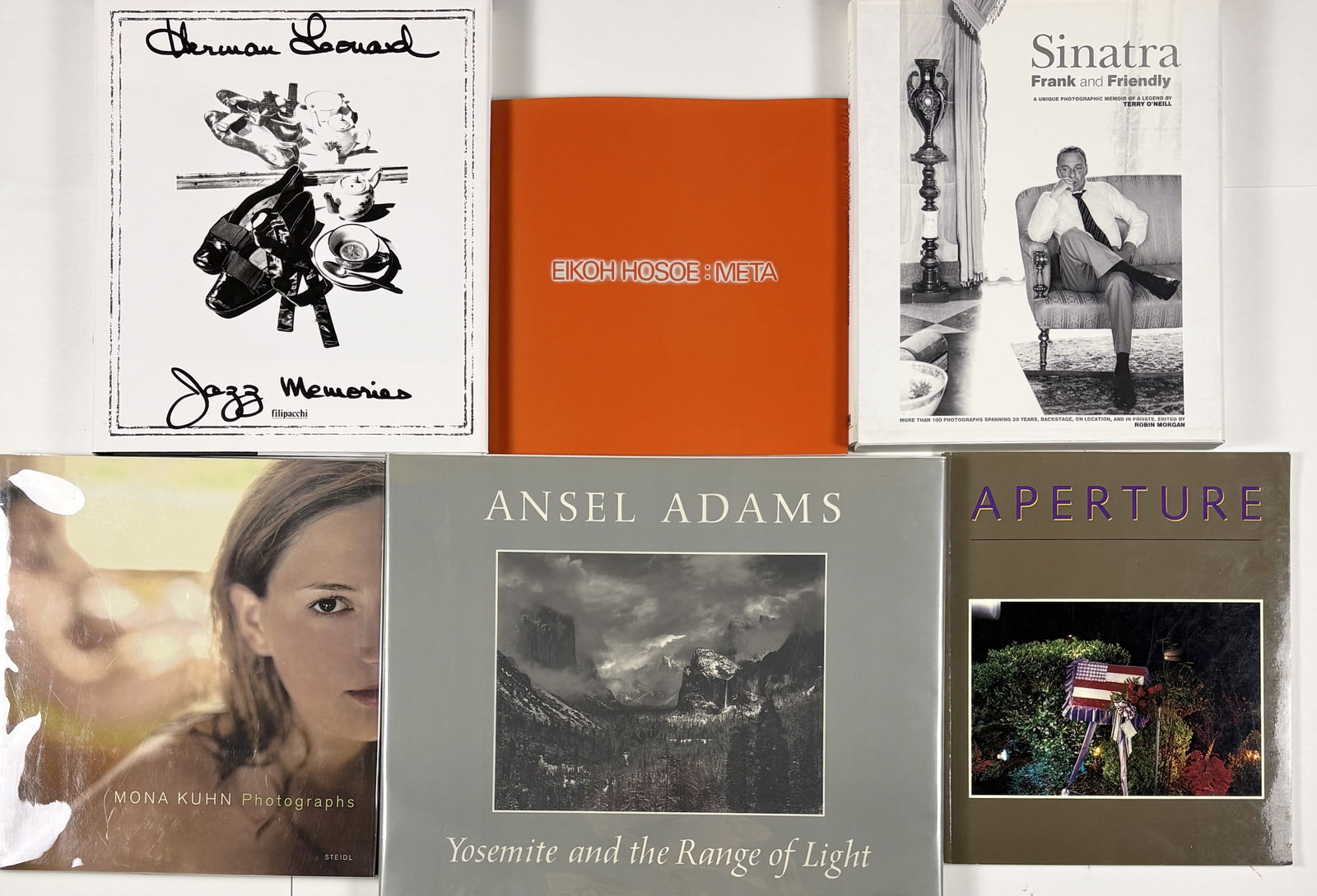 Lot of Photography Books – William Eggleston, Eikoh Hosoe, Herman Leonard, Mona Kuhn: Photography Books, Assorted Titles Printed books Group of photography books featuring works by William Eggleston, Eikoh Hosoe, Herman Leonard, and Mona Kuhn, along with additional titles shown. The
