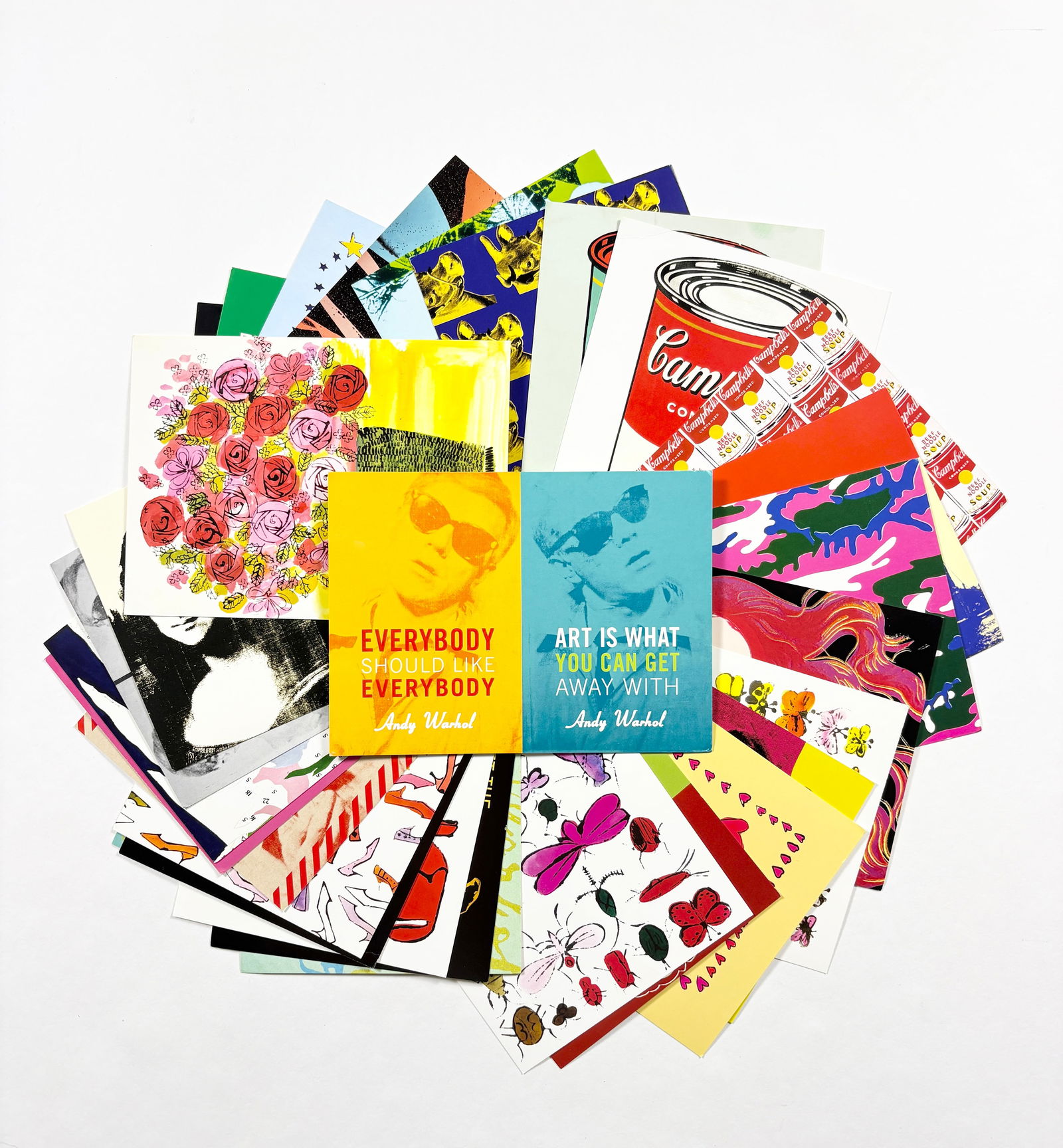 Large Grouping of Andy Warhol Postcards: Large grouping of vintage art postcards reproducing iconic works by Andy Warhol. The assortment includes a wide range of well-known Pop Art imagery, featuring bold colors and graphic compositions