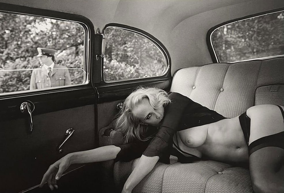 Marc Lagrange - Hiding, 2011: MARC LAGRANGE (1957–2015) Hiding, 2011 A striking black-and-white photograph by Belgian fine art photographer Marc Lagrange, known for his cinematic staging and sensual portraiture. Hiding captures