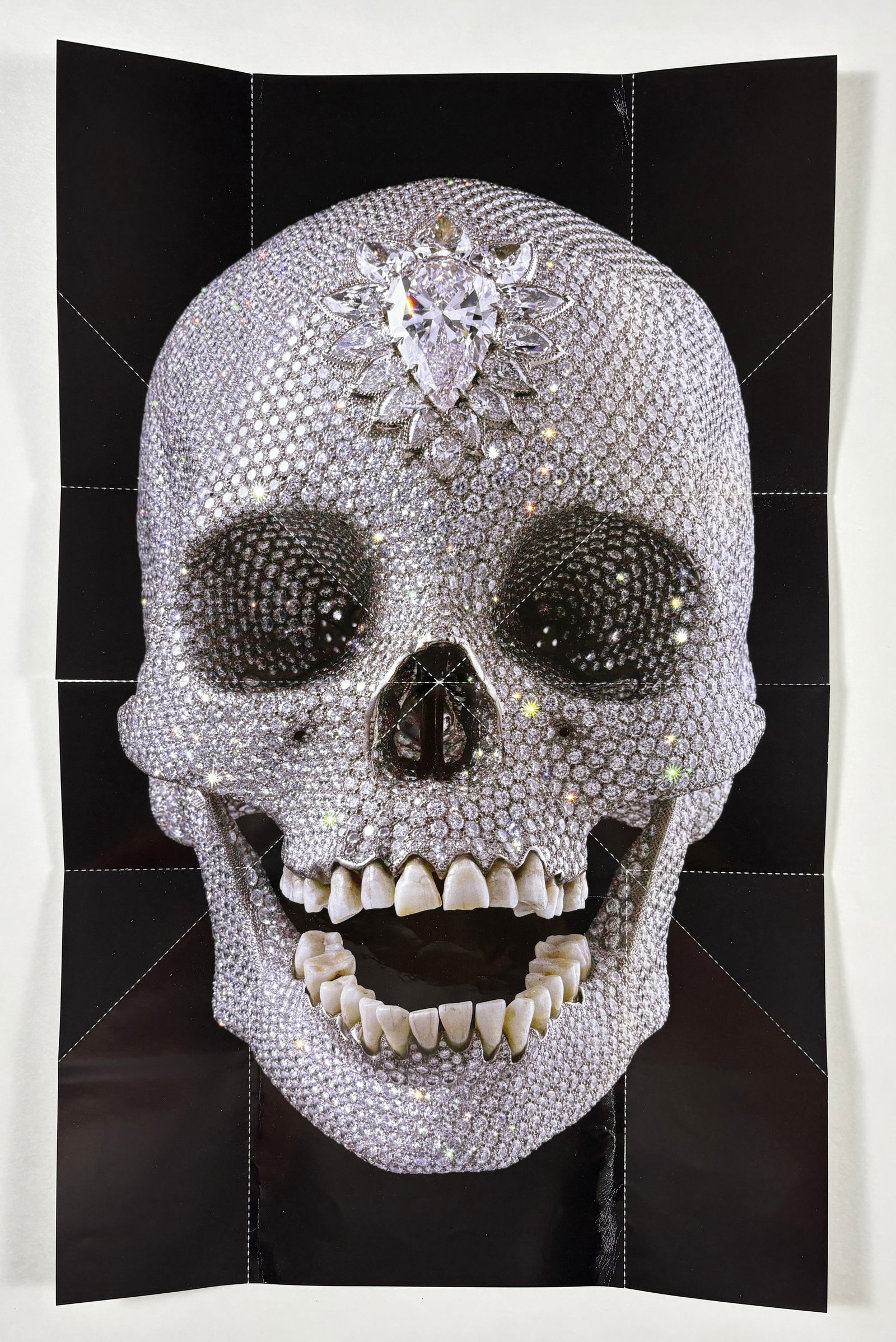 Damien Hirst - Skull, Offset Lithograph: Damien Hirst (1965– ) Skull offset lithograph on paper 17.5 x 11 inches This offset lithograph depicts a frontal view of a skull encrusted with faceted stones, an image derived from Damien