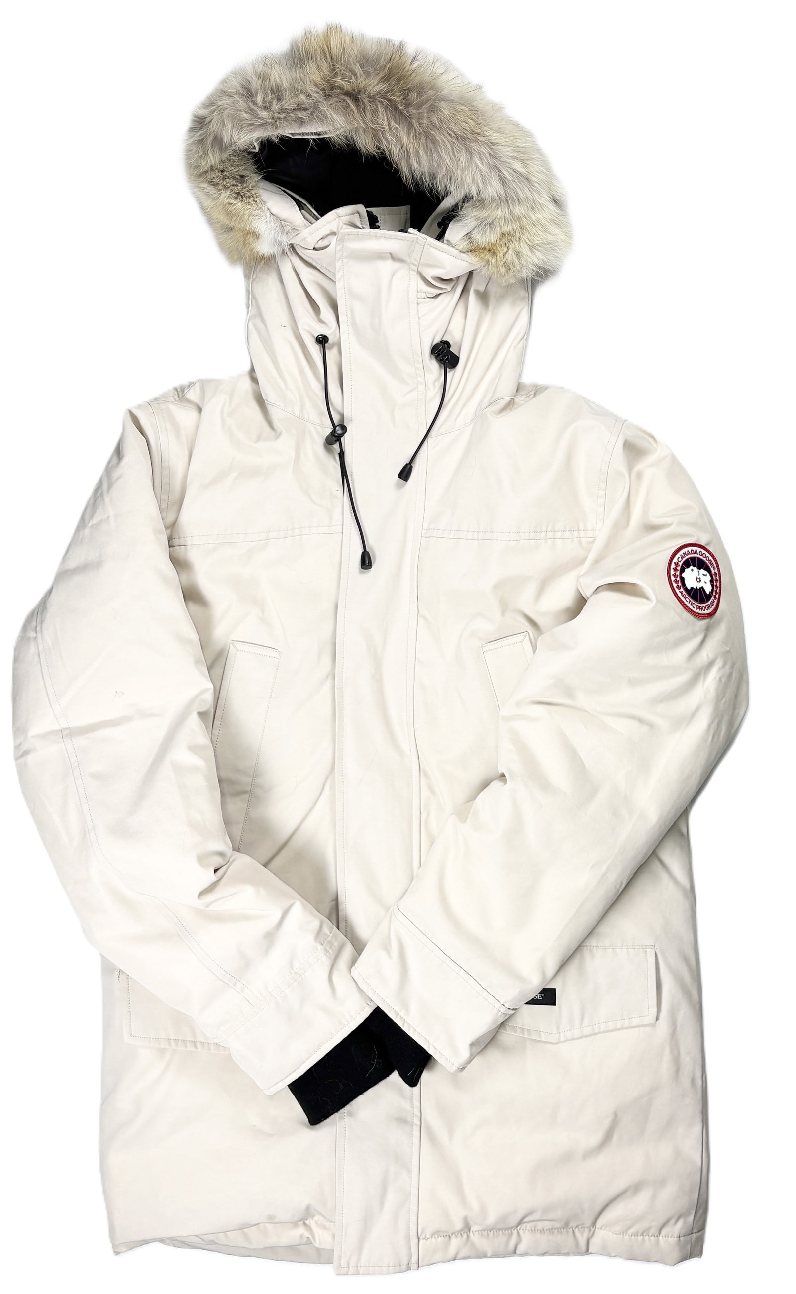 Canada Goose - White Fur-Trim Hooded Down Parka, Size Large: CANADA GOOSE Down parka with fur-trimmed hood, size large white down-filled parka coyote fur-trimmed hood Canada Goose Arctic Program badge to left arm A white down-filled parka with Canada Goose Arct