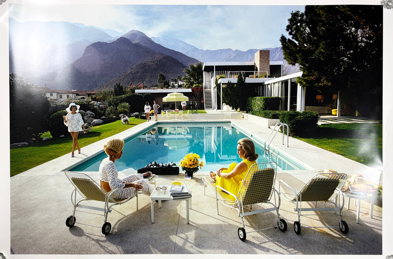 Slim Aarons - Poolside Gossip C-Print: SLIM AARONS (American, 1916-2006) Poolside Gossip, circa 1970, printed later C-print with Getty Images Archive blindstamp accompanied by COA 40.5 x 59.5 in. (102.9 x 151.1 cm) One of Slim Aarons’s m
