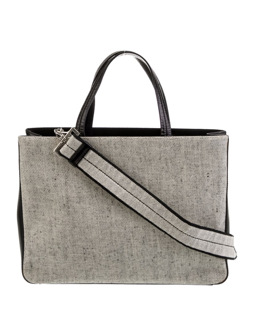 Prada White Canvas Logo Jacquard Tote: Condition is Very Good, pre-owned. Details: From the 1990's Collection, White Canvas, Silver-Tone Hardware, Flat Handles, Single Shoulder Strap, Leather Trim Embellishment, Logo Jacquard Lining, Singl