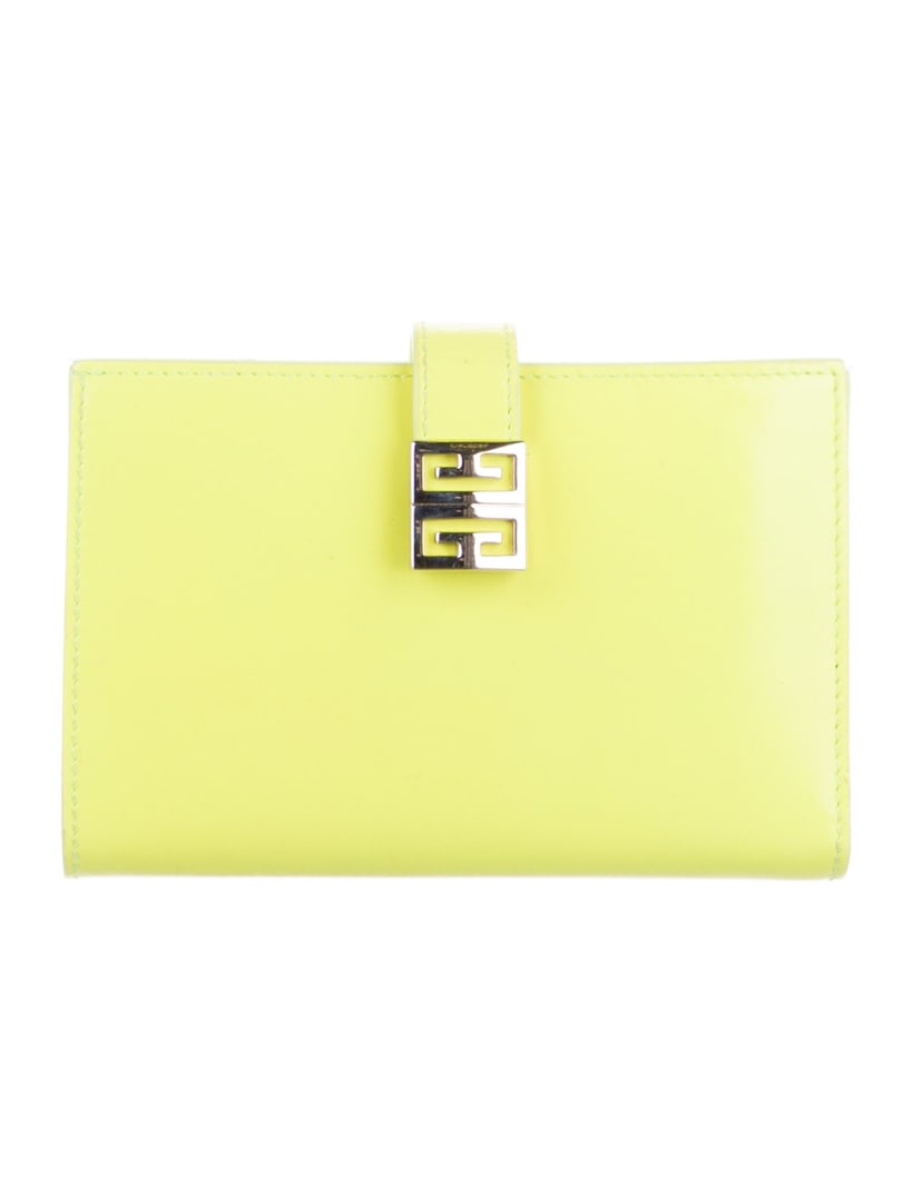 Givenchy Yellow Leather Jacquard Compact Wallet: Condition is Excellent, pre-owned. Details: Yellow Leather, Silver-Tone Hardware, Jacquard Lining, Five Interior Pockets with Card Slots, Snap Closure, Includes Box, Dust Bag, Height: 4", Width: 5.25"