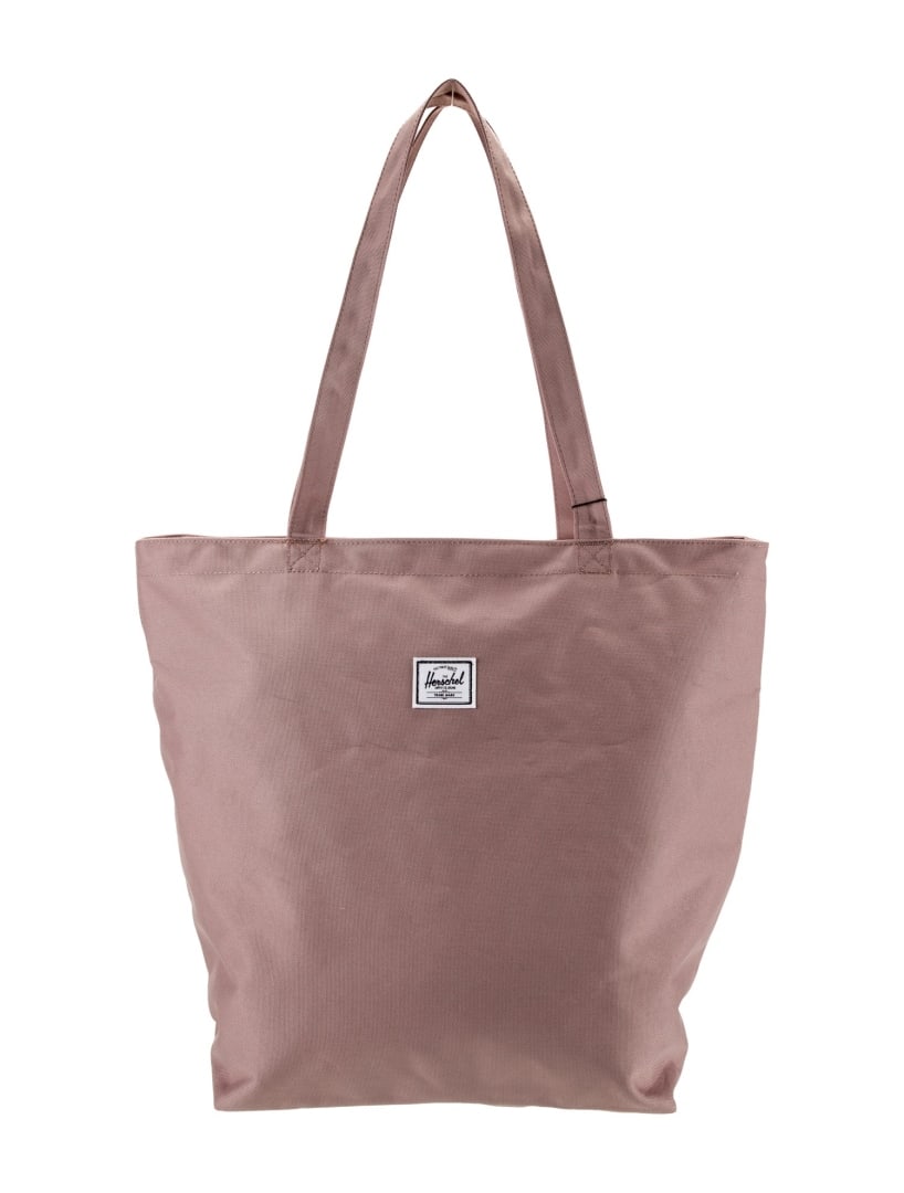 Herschel Supply Co. Nylon Tote: Condition is very good, pre-owned. Details: pink nylon, tonal hardware, flat handles, dual shoulder straps, nylon lining, dual interior pockets, snap closure at top, shoulder strap drop: 11. 5", heigh