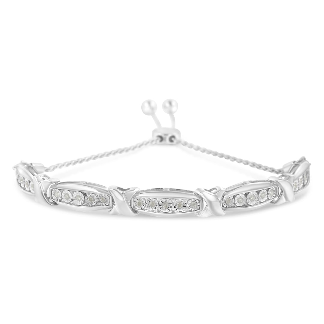 Cute .27ct Diamond Tapered Bar & X Bolo Bracelet: Length: 7". A stunning bracelet adorned with 25 natural round diamonds, totaling 0. 27 carats, securely set in a mesmerizing miracle setting. These diamonds exhibit a clarity of i3 and feature an i-j 