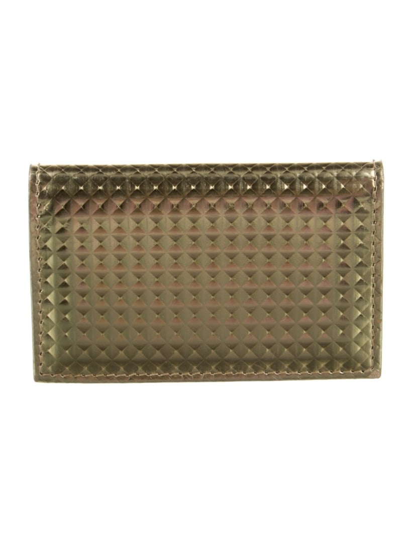 Jimmy Choo Gold Leather Snap Closure Bifold Wallet: Condition is very good, pre-owned. Details: gold leather, gold-tone hardware, leather lining, snap closure, gender: women, minor marking at interior. Keywords: luxury, designer, bifold, trifold, card