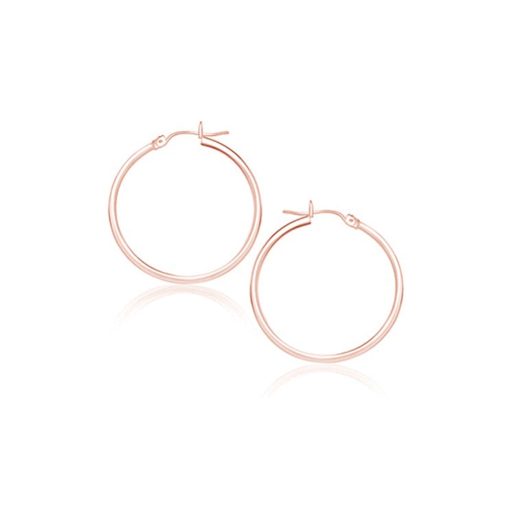 14k Rose Gold Polished Hoop Earrings 25mm: These timeless hoop earrings are crafted in 14k rose gold and measure 25 millimeters in diameter, featuring a snap lock backing. Earring information: length: 0. 98 inches, width: 0. 08 inches, diamete