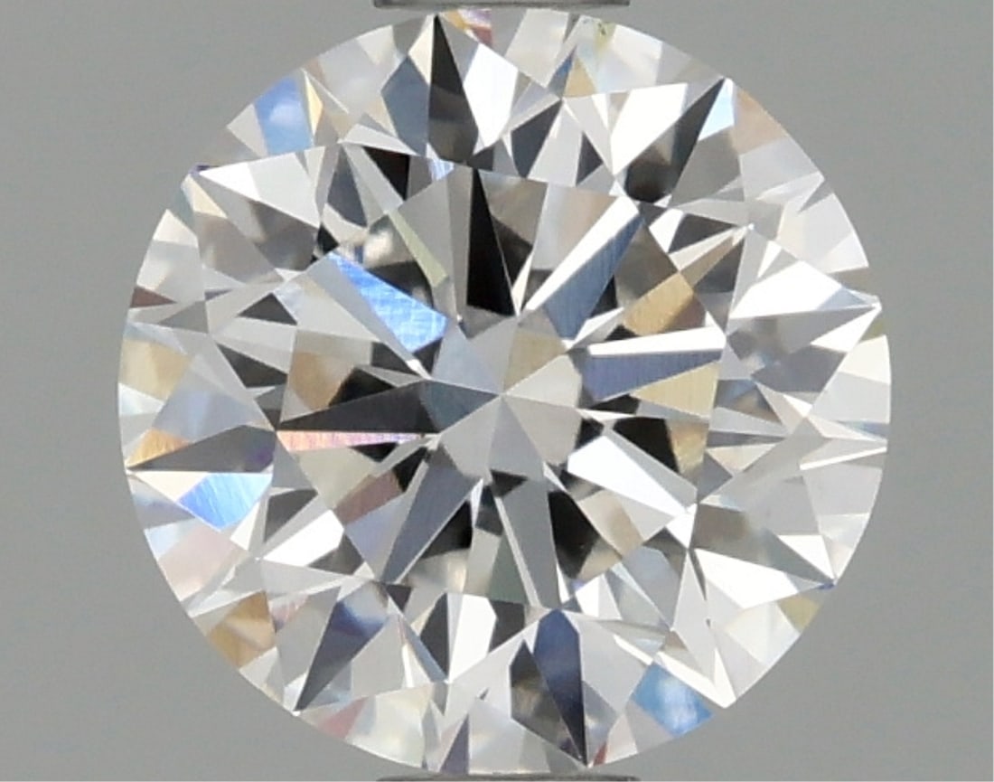 Igi Certified Round Cut .96ct Vs1 Lab Diamond: This igi-certified lab-grown round cut diamond weighs 0. 96 carats. It features f color grade and vs1 clarity, with ideal cut, excellent polish, and excellent symmetry with no fluorescence. The diamon