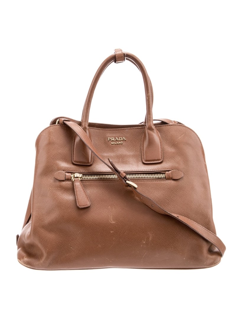 Prada Saffiano Leather Promenade Top Handle Bag: Condition is good, pre-owned. Details: naturale saffiano cuir leather, saffiano leather, gold-tone hardware, rolled handles & single adjustable shoulder strap, single exterior pocket, logo jacquard li
