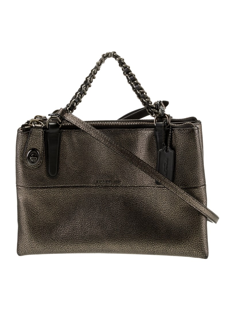 Coach 1941 Black Antiqued Gold-tone Shoulder Bag: Condition is very good, pre-owned. Details: black, antiqued gold-tone hardware, chain-link handles, single adjustable shoulder strap, dual exterior pockets, logo jacquard lining, dual interior pockets