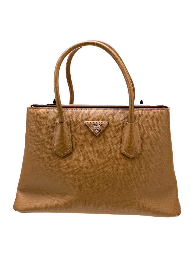 Prada Caramel Saffiano Cuir Leather Shoulder Bag: Condition is: very good, pre-owned. Details: by miuccia prada, caramel & caramel saffiano cuir leather, silver-tone hardware, leather trim, rolled handles & single adjustable shoulder strap, leather l