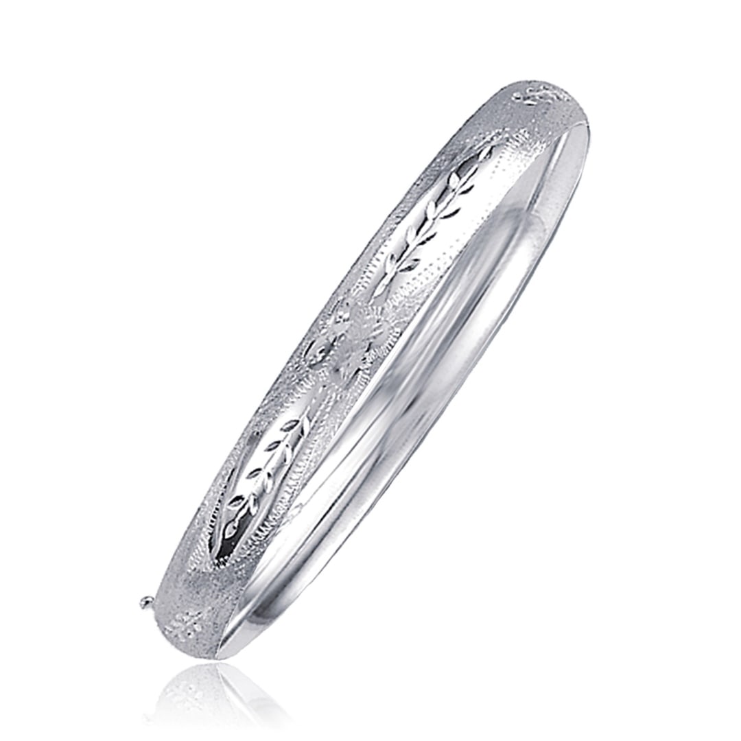 14k White Gold Classic Floral Carved Bangle: Chain length: 7''. A classic floral carved high polish bangle crafted in 14k white gold with a hidden clasp. Bangle information: width: 0. 24 inches, clasp type: hidden-safety-clasp, approximate weigh