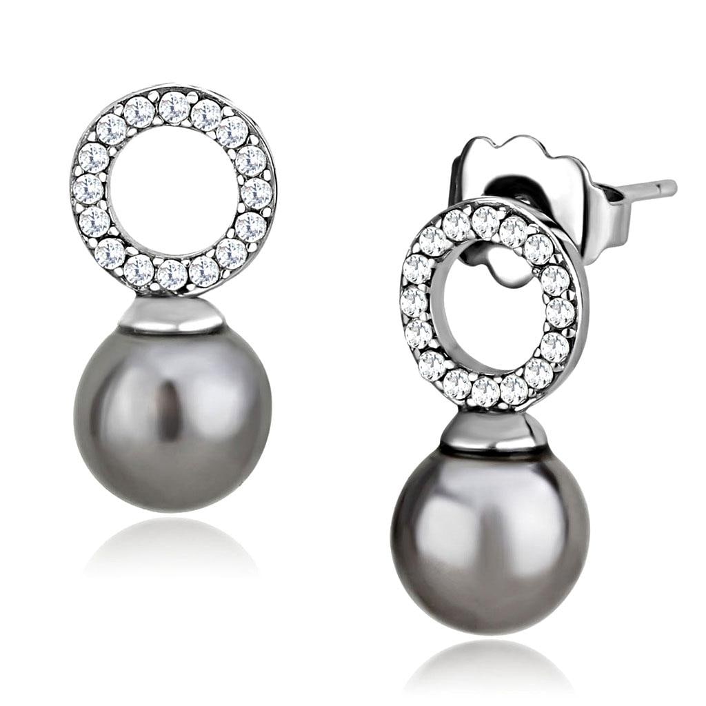 Timeless .08ct Topaz & Gray Pearl Post Earring: Made with stainless steel high polished. Believed to be synthetic pearl. Weight (approx): 1. 15 (g). Center stone size: 7 mm