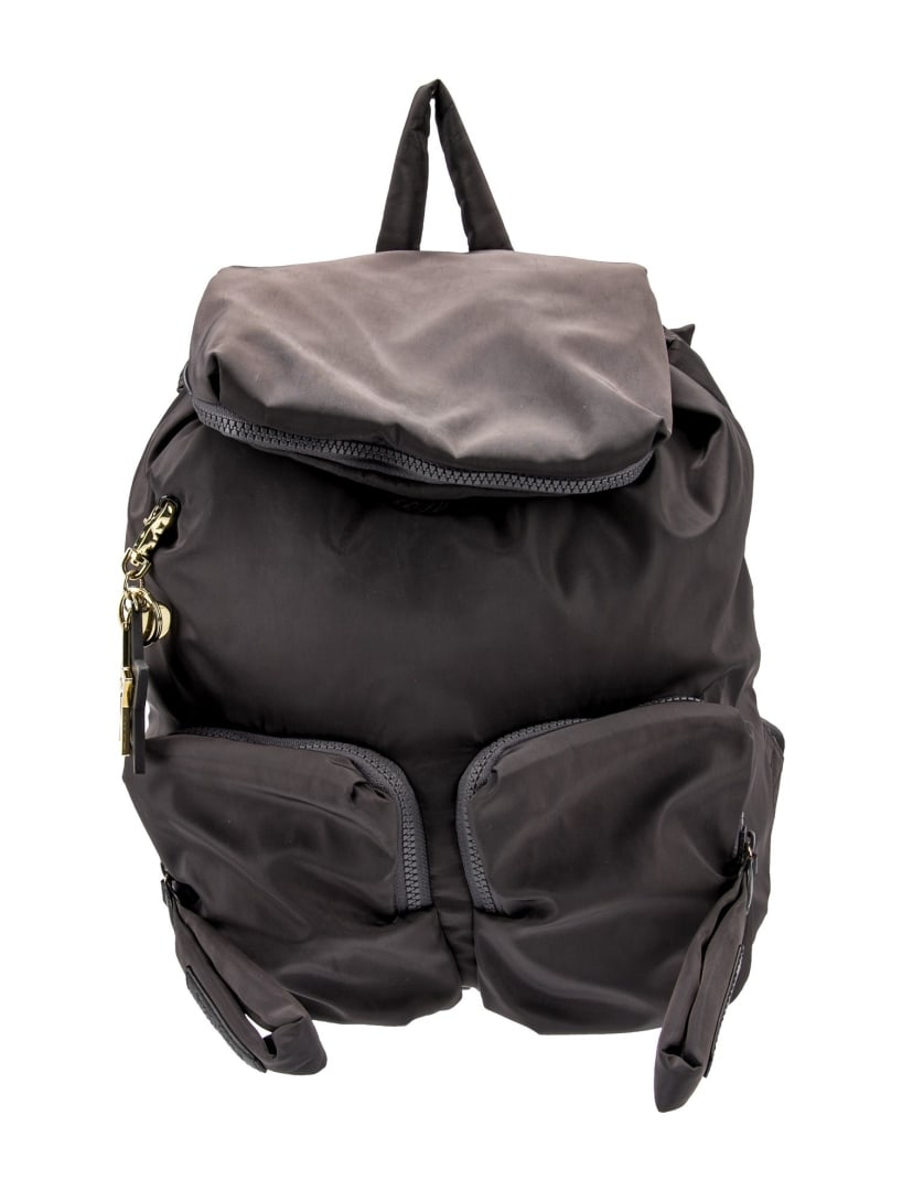 See By Chloe Grey Nylon Drawstring Cls Backpack: Condition is: very good, pre-owned. Details: grey nylon, gold-tone hardware, leather trim, flat handle & dual adjustable shoulder straps, leather trim embellishment & three exterior pockets, canvas li