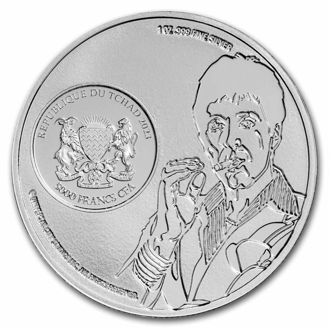 2023 5000 Francs Scarface 40th Anniversary Coin: This 1 oz silver coin celebrates the 40th anniversary of the iconic movie scarface, made from . 999 fine silver. It comes in a protective capsule. The obverse features the chad coat of arms alongside