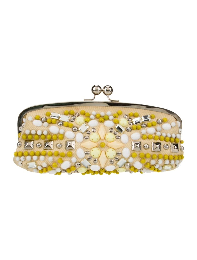 Chloe Yellow Canvas Floral Printed Studded Clutch: Condition is good, pre-owned. Details: yellow canvas, floral print, silver-tone hardware, beaded & studded accents, canvas lining & single interior pocket, kiss-lock closure at top, height: 5. 25", wi