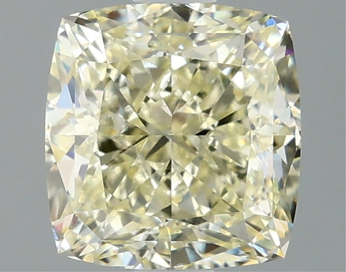 Fancy Yellow Cushion Cut 2.06ct Vs1 Lab Diamond: This igi-certified lab-grown cushion cut diamond weighs 2. 06 carats and showcases a fancy light yellow color with vs1 clarity. It features excellent polish and excellent symmetry, ensuring a high-qua