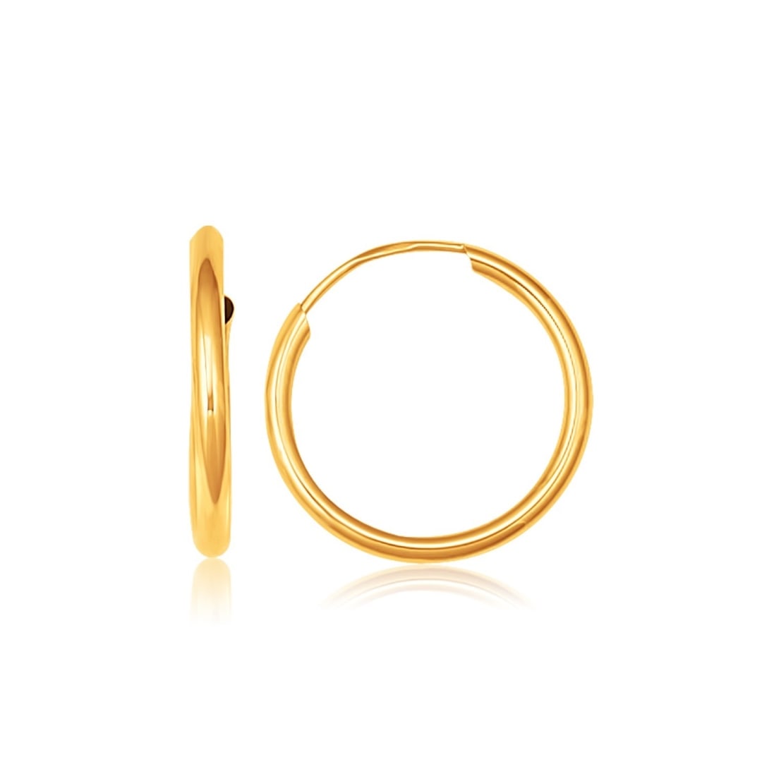 10k Gold Polished Endless Hoop Earrings 1.5mm: A simple pair of hoop earrings but a must-have for any jewelry collection. These earrings are crafted in fine 10k gold and feature beautiful endless hoops. Earring information: diameter: 14mm, width: 