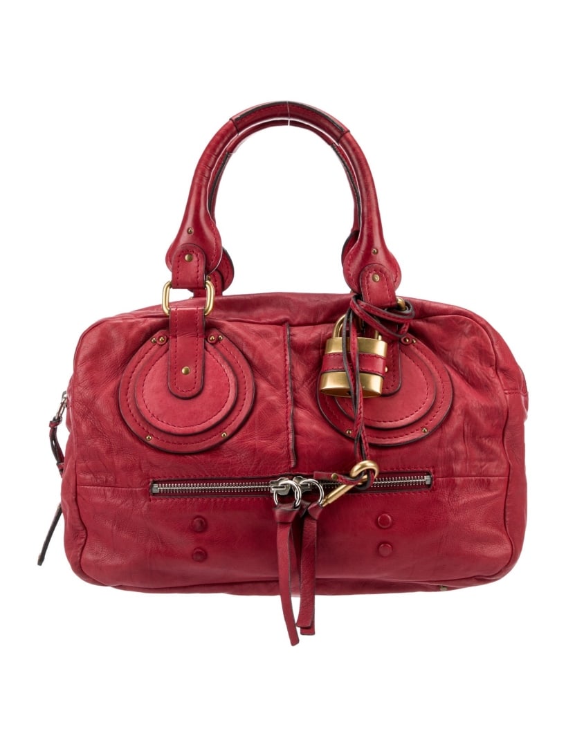 Chloe Red Leather Multitonal Hdw Studded Shldr Bag: Condition is: good, pre-owned. Details: red leather, multitonal hardware, rolled handles & dual shoulder straps, studded accents & single exterior pocket, twill lining & single interior pocket, zip cl