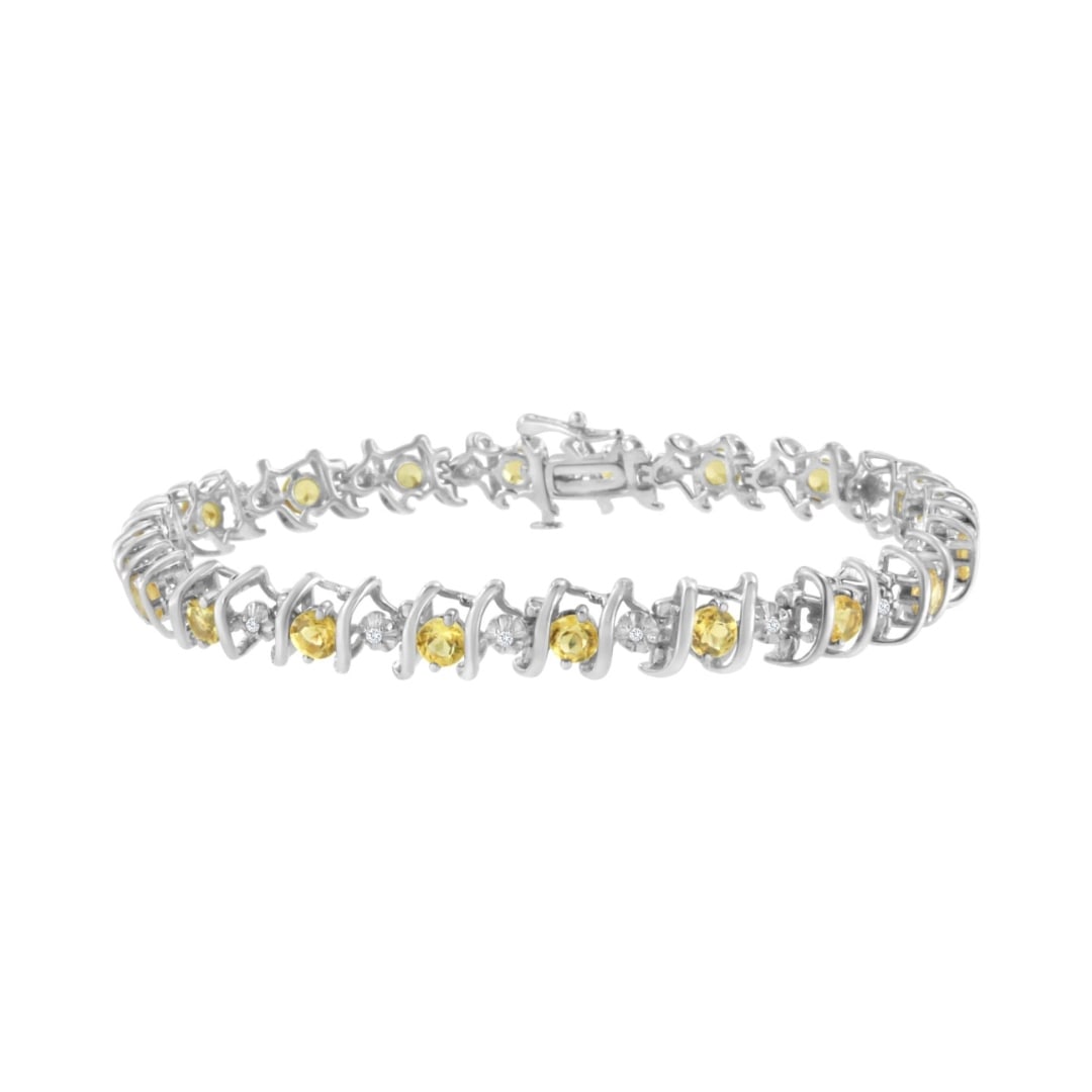 Elegant 4.62ct Citrine & Diamond Tennis Bracelet: Length: 7. 25". This bracelet features 20 round-cut color-treated lab-created citrine, totaling 4. 47 carats, beautifully set in a prong setting, showcasing a warm and captivating golden hue of aaa+ q