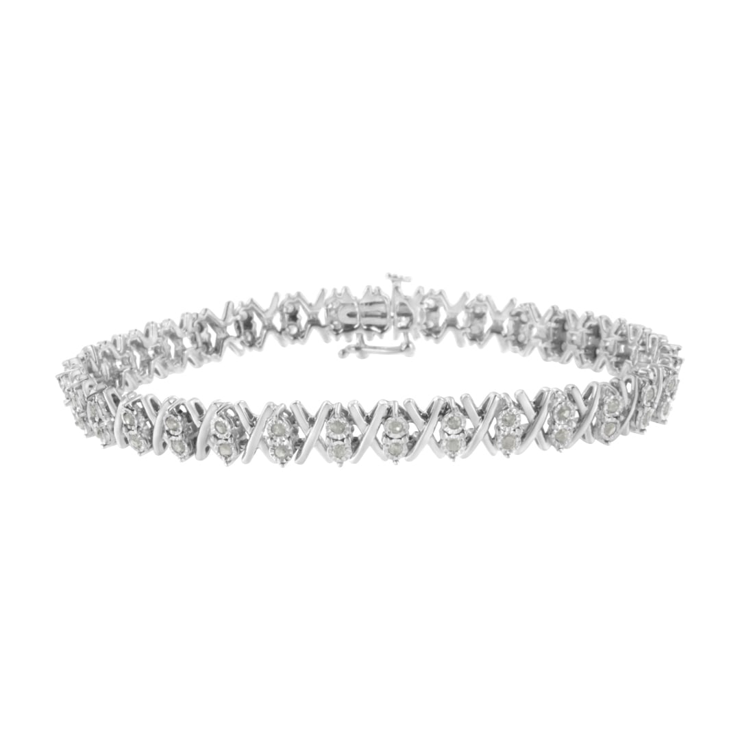 Sparkling 1.07ct Diamond X-link Tennis Bracelet: Length: 7". This is a captivating tennis bracelet, adorned with a total of 66 genuine round-cut diamonds, totaling 1. 07ct, beautifully set in a miracle setting for a continuous and brilliant display.