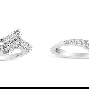 10k Gold Round .23ct Diamond 2-stone Bypass Ring: Ring size: 6.5. Refine your jewelry collection with this dazzling diamond ring. Rendered in gleaming 10k white gold, it features two radiant round diamonds nestled in a striking miracle setting,