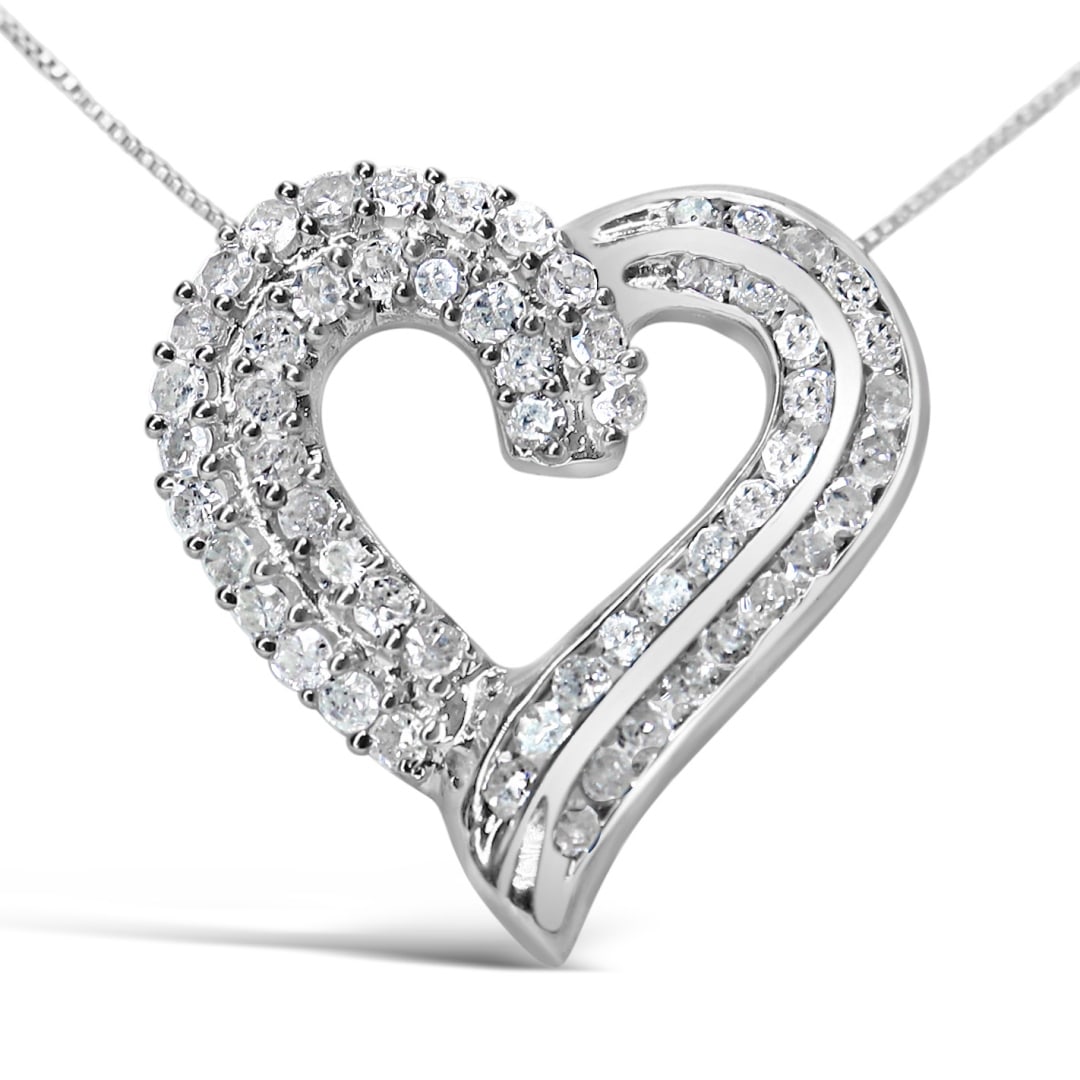Elegant 1.00ct Diamond Ribbon Heart Necklace: Length: 18". A striking pendant necklace adorned with 58 genuine round-cut diamonds, totaling 1. 00 carat. These diamonds are beautifully set in a combination of prong and channel settings, creating a