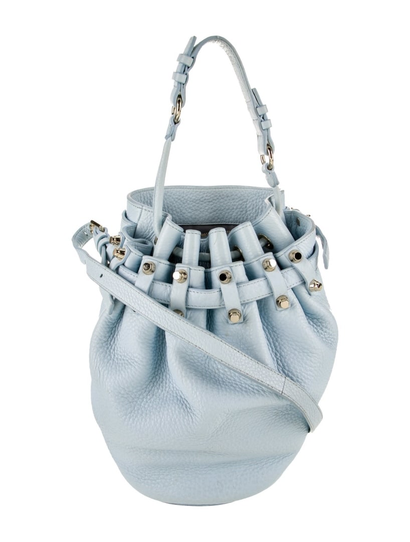 Alexander Wang Blue Leather Studded Bucket Bag: Condition is: good, pre-owned. Details: blue leather, gold-tone hardware, flat handle & single adjustable shoulder strap, studded accents & dual exterior pockets, nylon lining & single interior pocket