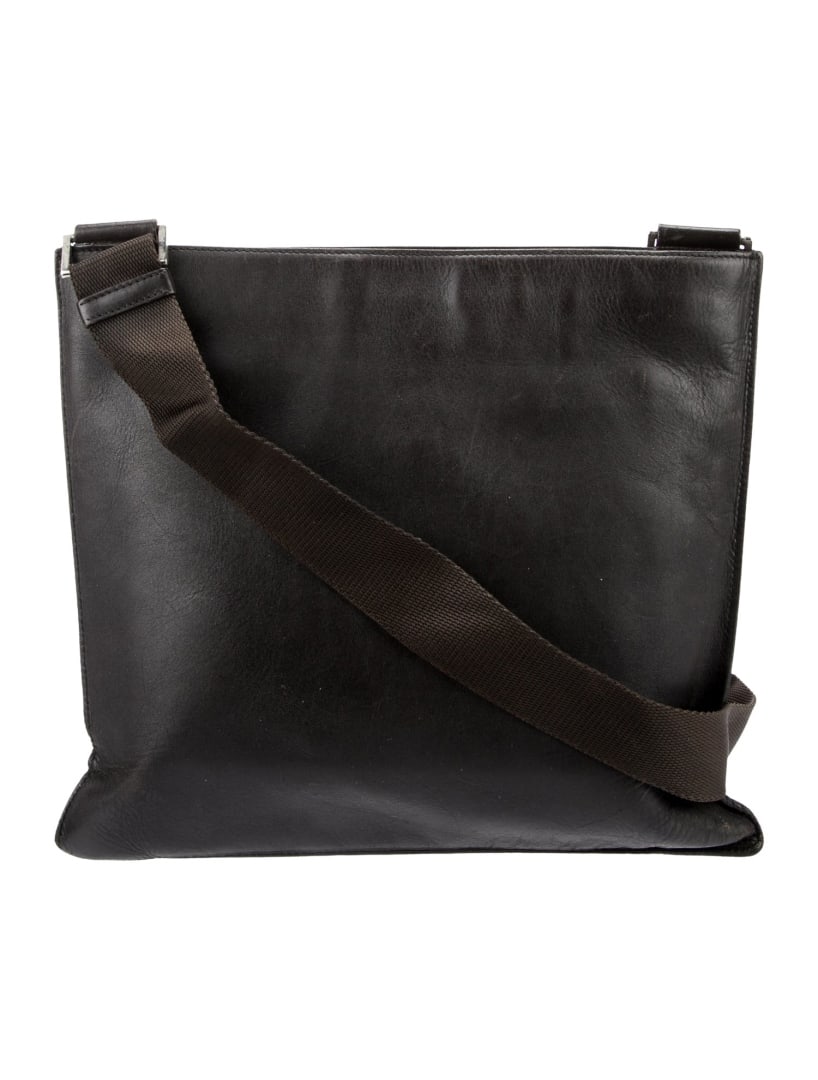 Prada Brown Leather Silver-tone Hdw Messenger Bag: Condition is good, pre-owned. Details: brown leather, silver-tone hardware, leather trim, single shoulder strap, logo jacquard lining & single interior pocket, zip closure at top, shoulder strap drop: