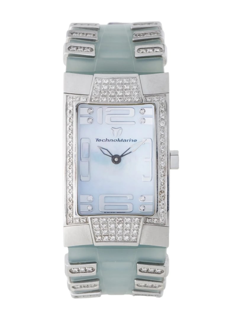 Technomarine Sport Dxsl Diamond Qtz Women's 24mm: Condition is good, pre-owned. Details: mother of pearl dial, tang buckle, fits a wrist size of 7" or smaller, model name: dxsl, serial number: 04***, movement: quartz, case shape: rectangle, case mate