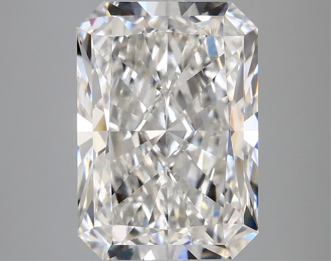 Igi Certified Radiant Cut 4.79ct Vs1 Lab Diamond: This igi-certified lab-grown radiant-cut diamond weighs 4. 79 carats, featuring an f color grade and vs1 clarity. It boasts excellent polish and excellent symmetry with no fluorescence. The diamond's 