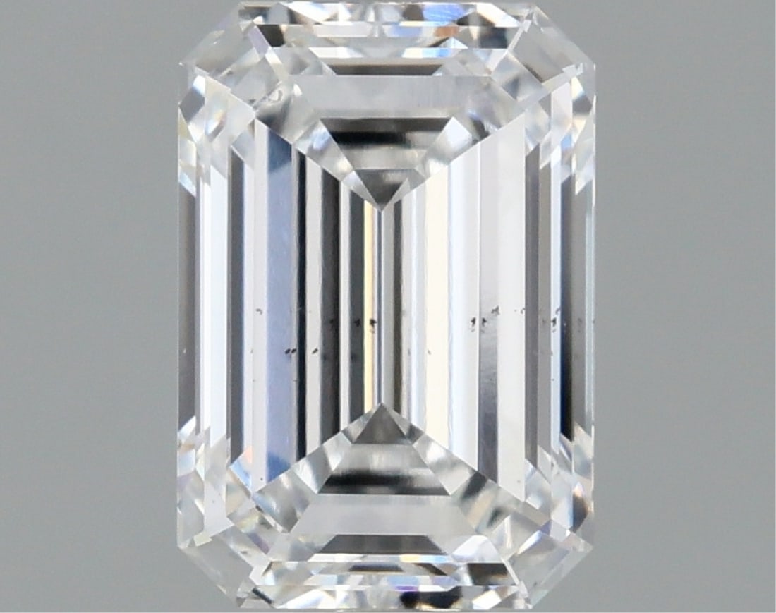 Igi Certified Emerald Cut 1.40ct Vs2 Lab Diamond: This igi-certified lab-grown emerald-cut diamond weighs 1. 40 carats and boasts an impressive e color grade alongside vs2 clarity. It features excellent polish and excellent symmetry with no fluoresce