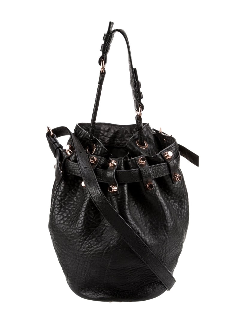 Alexander Wang Blk Leather Rose Studded Bucket Bag: Condition is: very good, pre-owned. Details: black leather, rose gold-tone hardware, flat handle & single shoulder strap, studded accents, nylon lining & single interior pocket, open top, protective f