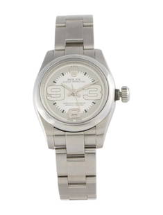 Rolex Oyster Perpetual Silver Dial Women's 26mm: Condition is good, pre-owned. Details: silver dial, president bracelet with deployant clasp, fits a wrist size of 5. 75" or smaller, collection: oyster perpetual, serial number: m8*****, production ye