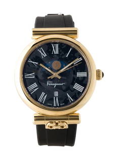 Salvatore Ferragamo Ora Moonphase Qtz Women's 40mm: Condition is pristine, pre-owned. Details: black dial, butterfly clasp, fits a wrist size of 6. 25" or smaller, collection: ora, model name: ora monophase, serial number: 22**********, movement: quart