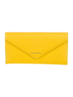 Balenciaga Yellow Leather Snap Wallet: Condition is: very good, pre-owned. Details: yellow leather, silver-tone hardware, leather lining & three interior pockets with card slots, snap closure, includes box & dust bag, height: 7. 5", width: