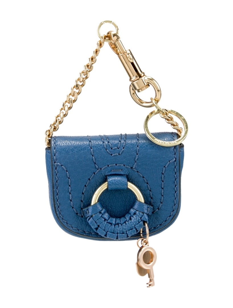 See By Chloe Blue Leather Gold-tone Hdw Shldr Bag: Condition is: good, pre-owned. Details: blue leather, gold-tone hardware, chain-link handle, canvas lining, snap closure at front, height: 2. 75", width: 3. 5", depth: 1", gender: women. Condition: mo