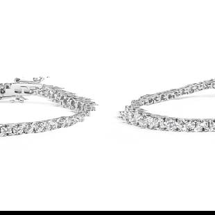 14k Gold 5.00ct Diamond Tennis Bracelet: Bracelet length: 7. 25". This exquisite 5. 00 carats diamond tennis bracelet is meticulously crafted in rhodium-plated solid 14k white gold. This stunning bracelet features 57 round cut lab-grown diam