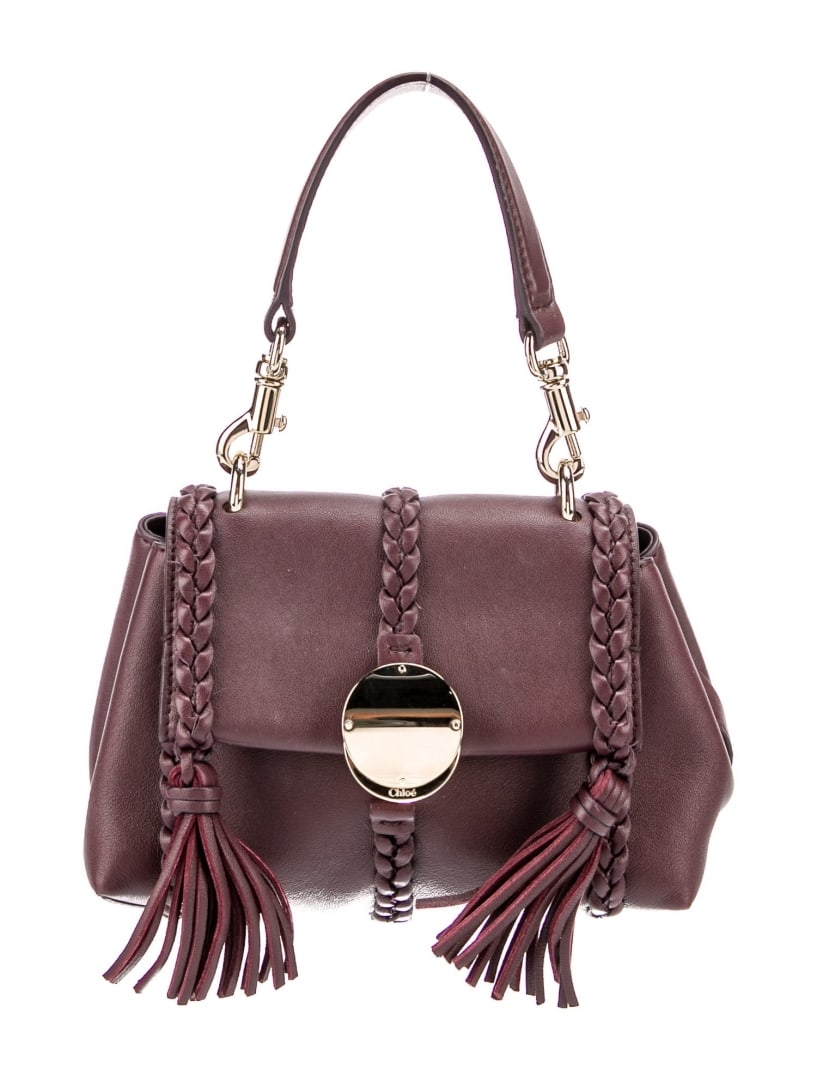 Chloe Purple Leather Braided & Tassel Top Hdl Bag: Condition is: good, pre-owned. Details: purple leather, gold-tone hardware, flat handle & single shoulder strap, braided & tassel accents, leather lining & single interior pocket, snap closure at fron