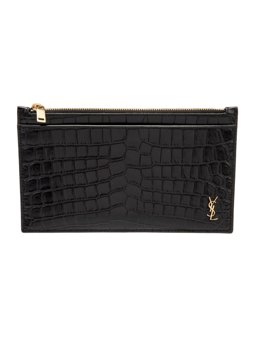 Saint Laurent Black Leather Zip Cls Clutch: Condition is: very good, pre-owned. Details: black leather, gold-tone hardware, single exterior pocket, grosgrain lining & single interior pocket, zip closure at top, height: 5", width: 8. 25", depth: