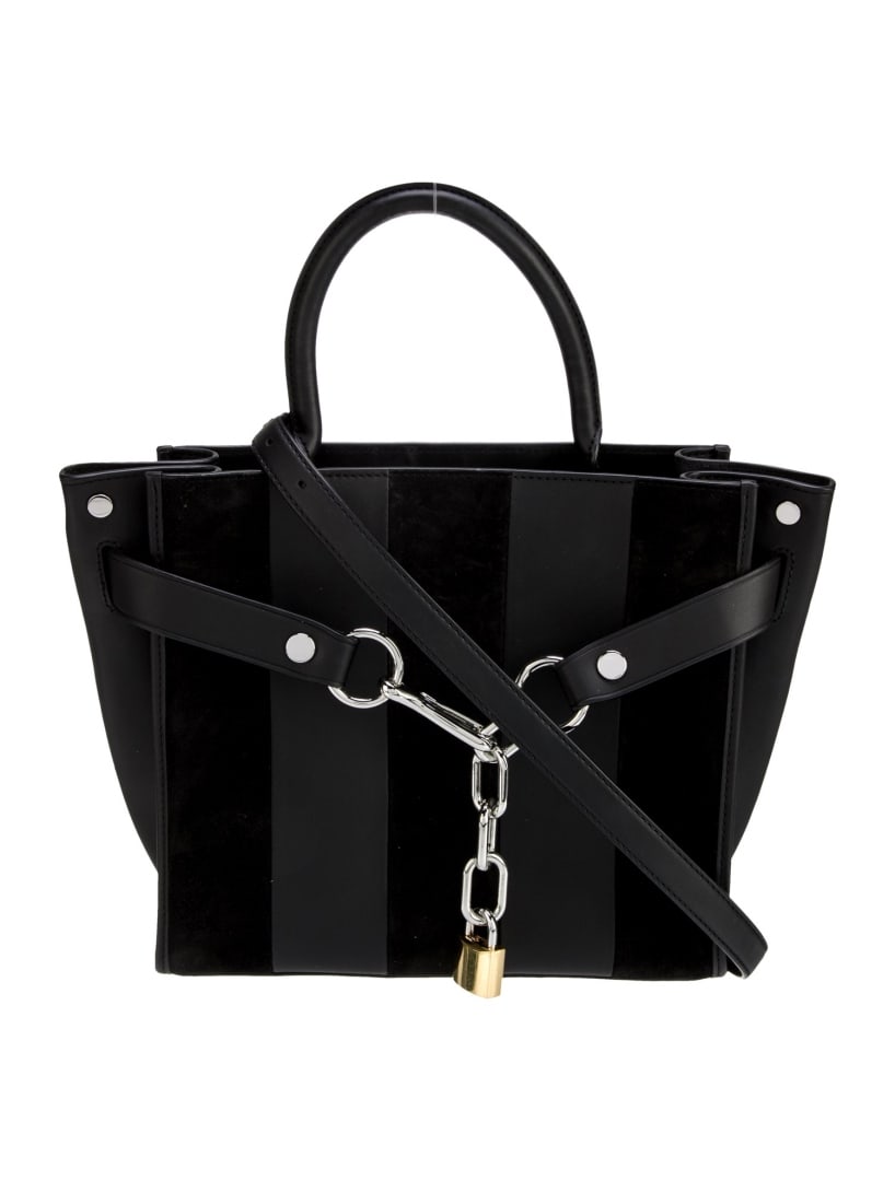 Alexander Wang Blk Leather Chain-link Top Hdl Bag: Condition is: good, pre-owned. Details: black leather, silver-tone hardware, rolled handle, chain-link accents, canvas lining & three interior pockets, snap closure at front, protective feet at base,