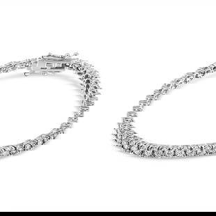 14k Gold 3.00ct Diamond Tennis Bracelet: Bracelet length: 7". This exquisite 3. 00 carats diamond bracelet is meticulously crafted in rhodium-plated solid 14k white gold. This stunning bracelet features 55 round cut lab-grown diamonds, secur