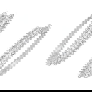 10k Gold .81ct Diamond Hoop Earrings: These rhodium-plated 10k white gold diamond huggie hoop earrings is a must-have, showcasing a total of 0. 81 carats with 72 round and 50 baguette natural diamonds. The polished white finish enhances t