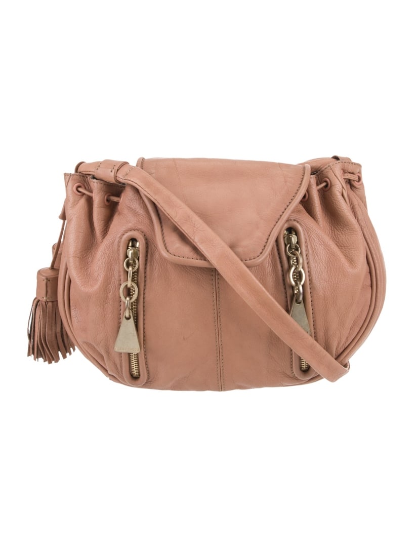 See By Chloe Red Leather Tassel Snap Crossbody Bag: Condition is: very good, pre-owned. Details: red leather, gold-tone hardware, single shoulder strap, tassel accents & dual exterior pockets, twill lining & single interior pocket, snap closure at fron