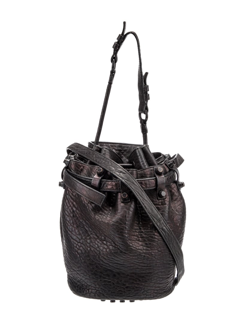 Alexander Wang Studded Leather Rose Bucket Bag: Condition is: good, pre-owned. Details: black leather, rose gold-tone hardware, flat handle & chain-link shoulder straps, studded accents & single exterior pocket, nylon lining & dual interior pockets