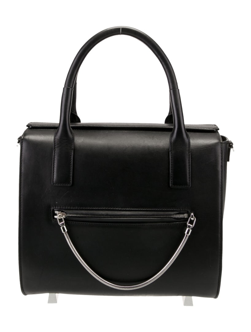 Alexander Wang Blk Leather Snap Cls Top Hdl Bag: Condition is: good, pre-owned. Details: black leather, silver-tone hardware, rolled handles & single adjustable shoulder strap, nylon lining & three interior pockets, snap closure at top, protective f