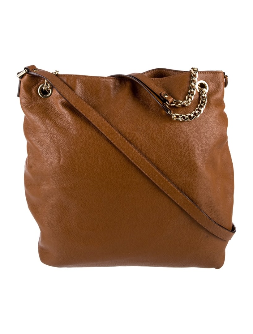 Michael Kors Brown Leather Chain-link Top Hdl Bag: Condition is: very good, pre-owned. Details: brown leather, gold-tone hardware, single adjustable shoulder strap, chain-link accents & single exterior pocket, logo jacquard lining, snap closure at top